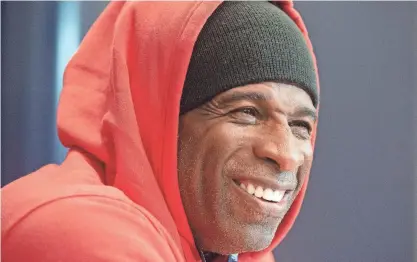  ?? BARBARA GAUNTT/CLARION LEDGER ?? Jackson State head coach Deion Sanders jokes with media during a news conference on Nov. 15, 2022, at JSU in Jackson.