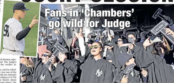  ?? Bill Kostroun (2) ?? ALL RISE! Yankees fans raise their gavels as they cheer for rookie right fielder Aaron Judge (inset), who has his own special section — The Judge’s Chambers — at every home game, including Wednesday’s 8-0 wipeout of the Red Sox.