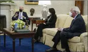  ?? PATRICK SEMANSKY — THE ASSOCIATED PRESS ?? President Joe Biden speaks during a meeting with lawmakers in the Oval Office of the White House in Washington on Monday to discuss the American Jobs Plan. Seated alongside Biden are Sen. Maria Cantwell, D-Wash., and Sen. Roger Wicker, R-Miss.