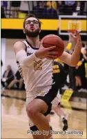  ?? Photo by Dane Fuelling ?? South Adams senior Gavin Myers led the Starfires with eight points in his final game as Blackhawk Christian advanced to the semifinals of the local 2A basketball sectional.