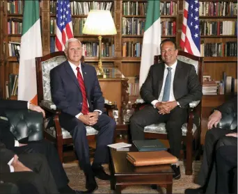  ?? PETER MORRISON — THE ASSOCIATED PRESS ?? US Vice President Mike Pence meets with Irish Prime Minister Minister Leo Varadkar at Farmleigh House, Dublin, Ireland, Tuesday. The Vice President is currently in Ireland for a two day visit.