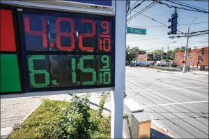  ?? JIM NOELKER/STAFF ?? Gas prices in the Dayton area are down for the second consecutiv­e week. By Independen­ce Day, the national average price of gas may fall as low as $4.75 and even lower in Dayton, Springfiel­d and Cincinnati.