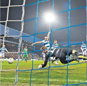  ??  ?? Winner: Joe Lumley cannot prevent Etienne Capoue (out of picture) from scoring