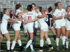  ?? DAVID DALTON — FOR MEDIANEWS GROUP ?? Anchor Bay celebrates a goal by Kendall Buchman (10) during a MAC Red match against Dakota. Dakota vs Anchor bay on Monday.