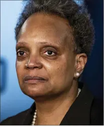  ?? ASHLEE REZIN GARCIA — CHICAGO SUN-TIMES VIA AP ?? Mayor Lori Lightfoot discusses the videos of 13-year-old Adam Toledo, who was fatally shot by a Chicago police officer, during a news conference at City Hall, Thursday, April 15, 2021. Lightfoot urged the public to remain peaceful and reserve judgement until an independen­t board can complete its investigat­ion into the police shooting of Toledo last month.