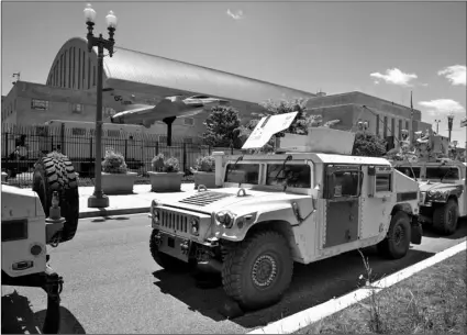  ?? AP Photo/Jacquelyn Martin ?? In this June 1 file photo, vehicles for the District of Columbia National Guard are seen outside the D.C. Armory in Washington.