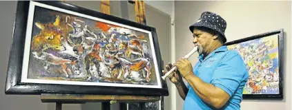  ?? Picture: RUVAN BOSHOFF ?? DOGGED: Tyrone Appollis says he sells his paintings so that he can play music and write