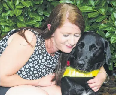  ?? Picture: Andy Payton FM4835518 ?? Sarah Rolfe with her guide dog, Logan