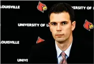  ?? AP PHOTO BY TIMOTHY D. EASLEY ?? David Padgett addresses the media after being named Louisville’s interim men’s basketball coach Friday in Louisville, Ky.