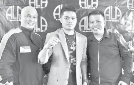  ??  ?? Jonas 'Zorro' Sultan of the ALA Boxing Gym (center) together with his trainers Edmund and Edito Villamor in a press conference yesterday at the Park Social in Cebu I.T Park.