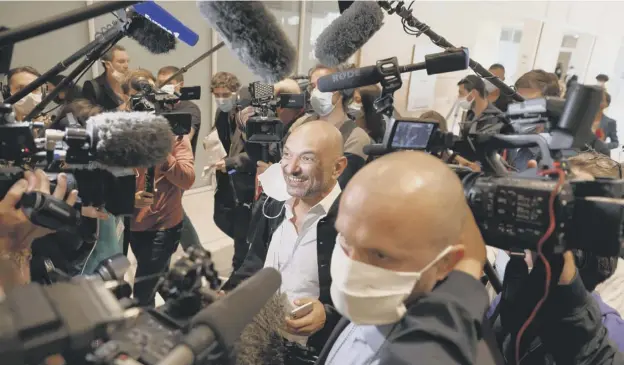  ?? PICTURE: THOMAS COEX/GETTY ?? 0 Charlie Hebdo’s lawyer Richard Malka arrives at the Paris court, ahead of the trial over the attacks which left 17 people and three gunmen dead