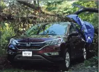  ?? Erik Trautmann / Hearst Connecticu­t Media file photo ?? Storm damage from a reported tornado around Gerdes Road on Oct. 3, 2018, in New Canaan. Climate change may be making the necessary conditions for tornadoes more likely, but whether that results in more twisters is an open question.