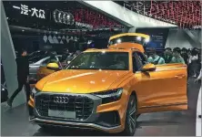  ?? LI FUSHENG / CHINA DAILY ?? FAW-Volkswagen showcases the Audi Q8 SUV at the Guangzhou auto show in November 2018.
