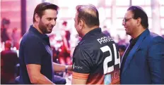  ?? Courtesy: Organiser ?? Shahid Afridi is greeted by Parvez Khan, Board Member of the T10 League, and Shaji Ul Mulk during the draft.