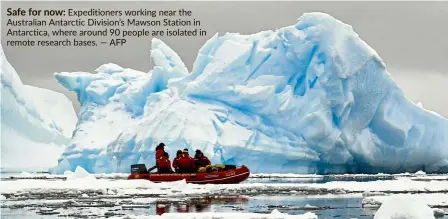  ??  ?? Safe for now: expedition­ers working near the australian antarctic division’s Mawson station in antarctica, where around 90 people are isolated in remote research bases. — aFp