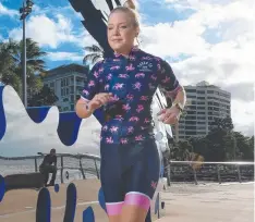  ??  ?? FIGHTING SPIRIT: Kate Phillips is competing in the Cairns Ironman, five years after a lung and heart transplant. Picture: JUSTIN BRIERTY