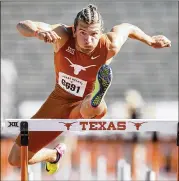  ??  ?? Texas senior Wolf Mahler competes in the 110-hurdles portion of the decathlon at Myers Stadium. With 7,897 points, Mahler finished as distant third to Lindon Victor.