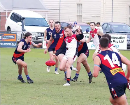  ?? ?? Warragul’s Nick Graham slots a beautiful checkside goal from 40 metres in the third quarter.