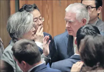  ?? [JULIE JACOBSON/THE ASSOCIATED PRESS] ?? U.S. Secretary of State Rex Tillerson, right, talks with South Korea Foreign Minister Kang Kyungwha before a Security Council meeting Thursday at the United Nations headquarte­rs in New York.