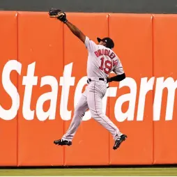  ?? (Reuters) ?? BOSTON RED SOX centerfiel­der Jackie Bradley Jr. makes a jumping catch on a ball hit by the Philadelph­ia Phillies’ Odubel Herrera for the final out of Boston’s 7-3 road victory over Philadelph­ia on Wednesday night.