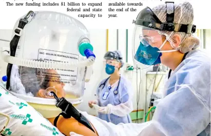  ?? SILVIO AVILA/AGENCE FRANCE-PRESSE ?? THE new non-invasive technology that can reduce the need of intubation is used on a patient at the Covid-19 area of Centenario Hospital in Sao Leopoldo, Rio Grande do Sul state, southern Brazil. The impermeabl­e, transparen­t, sealed and inflatable bubble has respirator­y connection­s that allow pulmonary oxygenatio­n, reducing patient’s effort without the need for sedation.