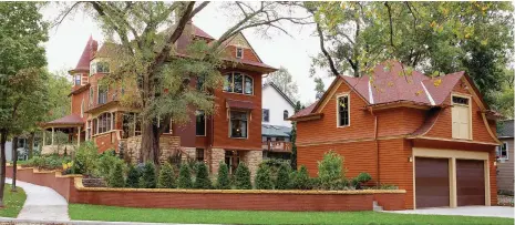  ??  ?? LEFT In the Victorian tradition, a garage with an apartment above, designed by David
Heide Design Studio, echoes the style and rooflines of the main house.