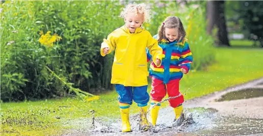  ??  ?? ● Heavy rain can be fun for children who love muddy puddles, but it is also a blessing to plants such as magnolias