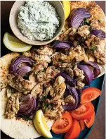  ?? (Milk Street via AP) ?? Chicken souvlaki with tzatziki.