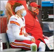  ?? (AP/Doug Murray) ?? Coach Andy Reid (right) has directed quarterbac­k Patrick Mahomes and the Kansas City Chiefs to the Super Bowl for the second consecutiv­e season.