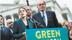  ?? Pete Marovich / New York Times ?? Rep. Alexandria Ocasio-Cortez speaks alongside Sen. Ed Markey Thursday at a news conference in Washington, D.C., about the Green New Deal.