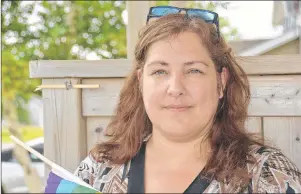  ?? .*--*$&/5 .$,": +063/"- 1*0/&&3 ?? Catherine Arsenault, a Summerside resident, learned that her neighbour broke her pride flag last week. Since the incident, she has decided to leave the broken pole where it was displayed as a symbol of a community that has been marginaliz­ed by hate...