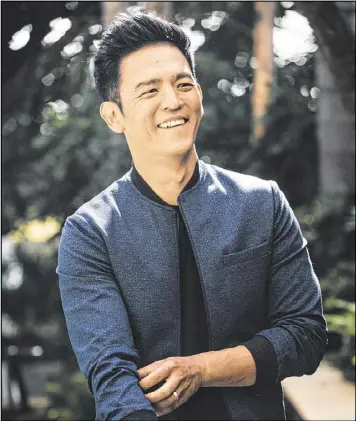  ?? ELIZABETH WEINBERG / NEW YORK TIMES ?? John Cho talks about playing Hikaru Sulu in the re-imagined “Star Trek” movie series and what it is like to be an Asian in the movie industry.