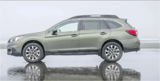  ?? BRENDAN MCALEER/ DRIVING ?? The new Outback has a roof rack with built- in crossbars. It also features a low roofline, making it easier to tie down your cargo.