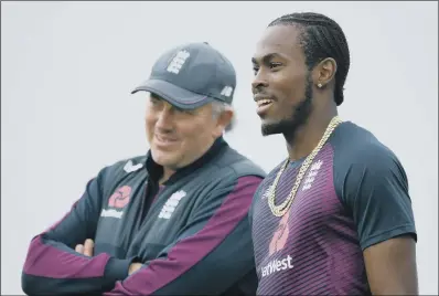  ?? PICTURE: GARETH COPLEY/PA. ?? WELCOME BACK: England head coach Chris Silverwood, with fast bowler Jofra Archer who is back with the squad.