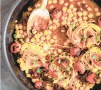  ?? ANDREW SCRIVANI NYT ?? Fried Tagliatell­e With Chickpeas and Smoky Tomatoes. So much of 2020 home cooking was about starting from staples.