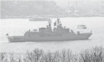  ?? — Reuters photo ?? Turkish Navy frigate TCG Yildirim (F-243), returning from the Blue Homeland naval exercise, sails in the Bosphorus in Istanbul.