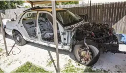  ??  ?? Showing the rear to front view of Crown Vic with roof partially cut.