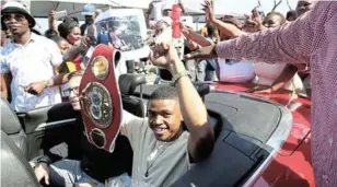  ?? /THEO JEPHTA ?? Boxing champion Sivenathi Nontshinga gets a hero’s welcome at the King Phalo airport in East London.