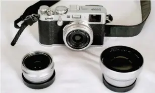  ?? ?? Adrian Johnson’s Fujifilm X100F and conversion lenses, which are perfect for travelling