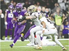  ?? CHRIS GRaYTHEN/GETTY IMAGES ?? Dalvin Cook was a force on the ground against New Orleans in the first half of Sunday’s NFC wild card game, and when the Saints adjusted to shut him down, the Minnesota passing attack opened up as the underdog Vikings pulled off the upset in overtime.