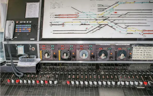  ??  ?? The Crewe Sorting Sidings North SB block instrument­s are built into the panel. Three are ‘Permissive’. They allow more than one train to occupy the section, and were once common on freight lines. Note the compact arrangemen­t. Small lights are being used in the place of cumbersome indicators. The instrument for the route to Gresty Lane (third from the left) was taken out of use when TCB working was installed.