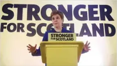  ?? ?? Scotland’s First Minister Nicola Sturgeon holds a press conference in Edinburgh on Wednesday after the Supreme Court blocked a new vote on independen­ce. (AFP)