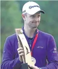  ??  ?? Justin Rose with the trophy.