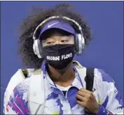  ?? Frank Franklin II Associated Press ?? NAOMI OSAKA wears a mask featuring George Floyd’s name before a match at the 2020 U.S. Open.