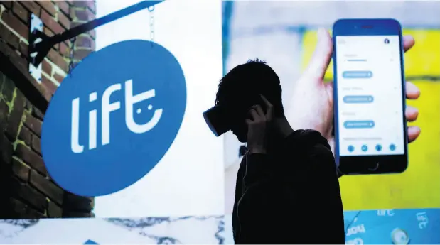  ?? DARRYL DYCK / THE CANADIAN PRESS ?? A man wears a VR headset at the Lift Cannabis Expo in Vancouver in January. The company believes its social media accounts were compromise­d.