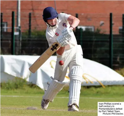  ??  ?? Ioan Phillips scored a half-century in Pontarddul­ais’s defeat by Port Talbot Town.
Picture: Phil Davies