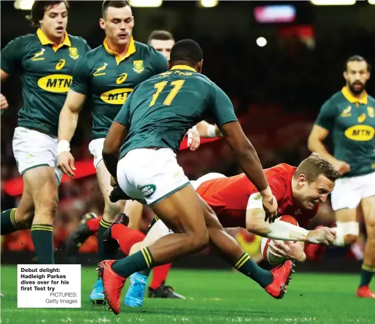  ?? PICTURES: Getty Images ?? Debut delight: Hadleigh Parkes dives over for his first Test try