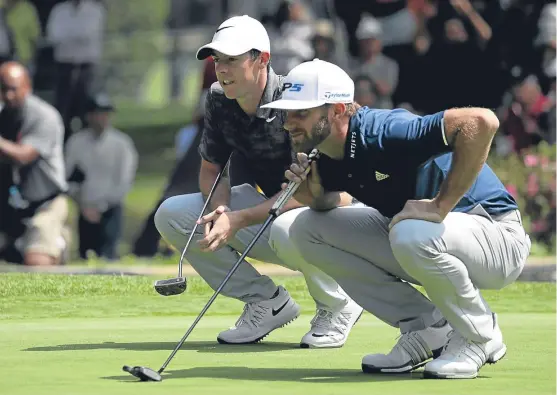  ?? Picture: Getty. ?? Dustin Johnson, seen with Rory McIlroy, was 74th out of 76 players in short putts in Mexico but still won.