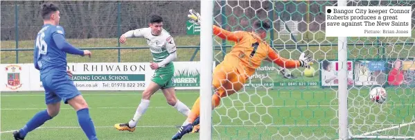  ?? Picture: Brian Jones ?? Bangor City keeper Connor Roberts produces a great save against The New Saints