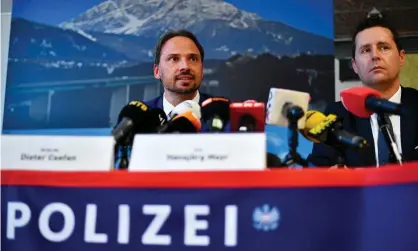  ??  ?? Austrian police announce the results of their doping raids at the Nordic skiing world championsh­ips on Wednesday. Photograph: Christian Bruna/EPA